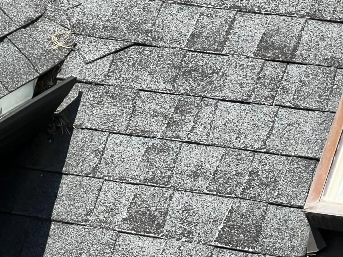 Tear-off in progress showing exposed deck